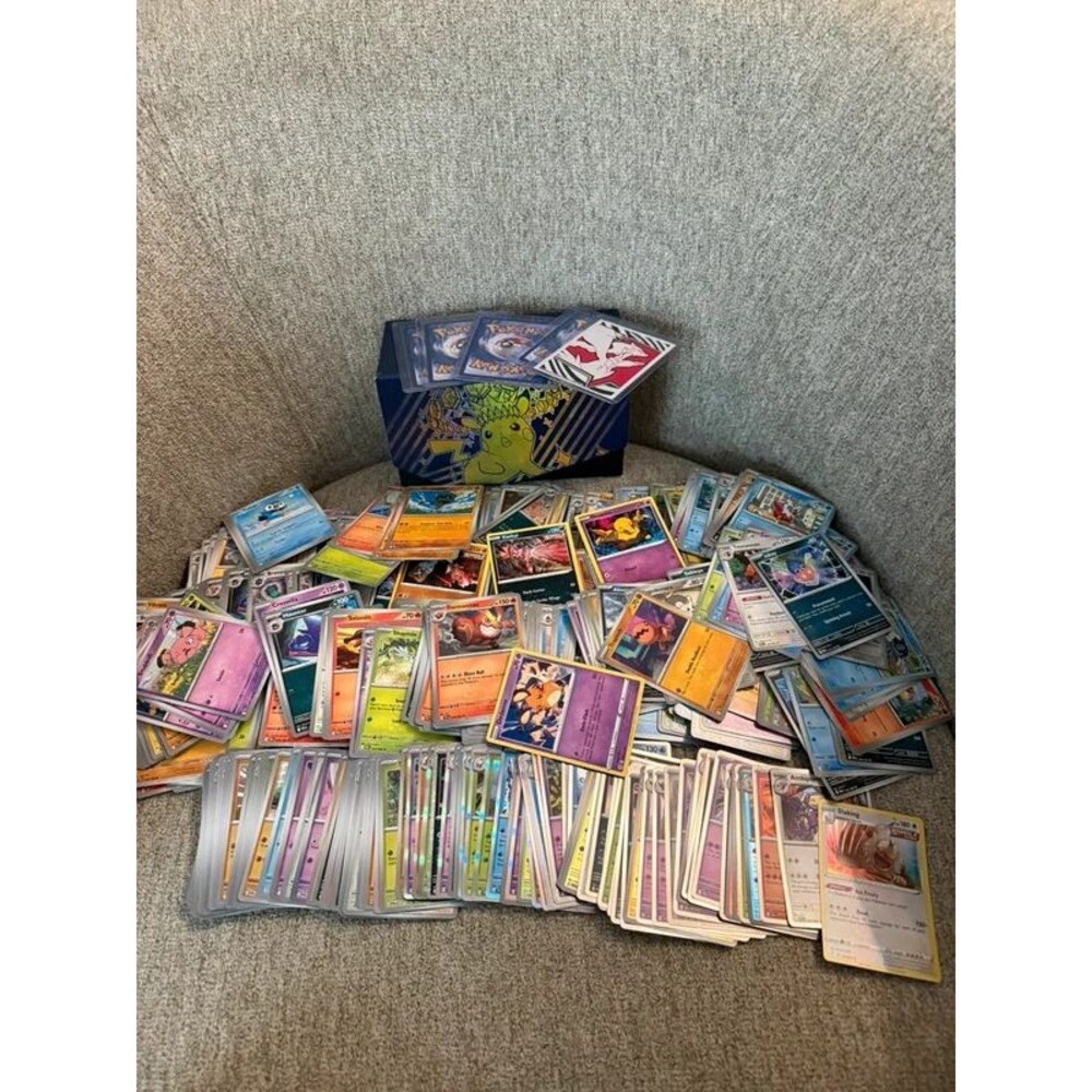 Large Pokémon TCG Card Bundle - 600+ Cards + Surging Sparks Pikachu ETB Storage